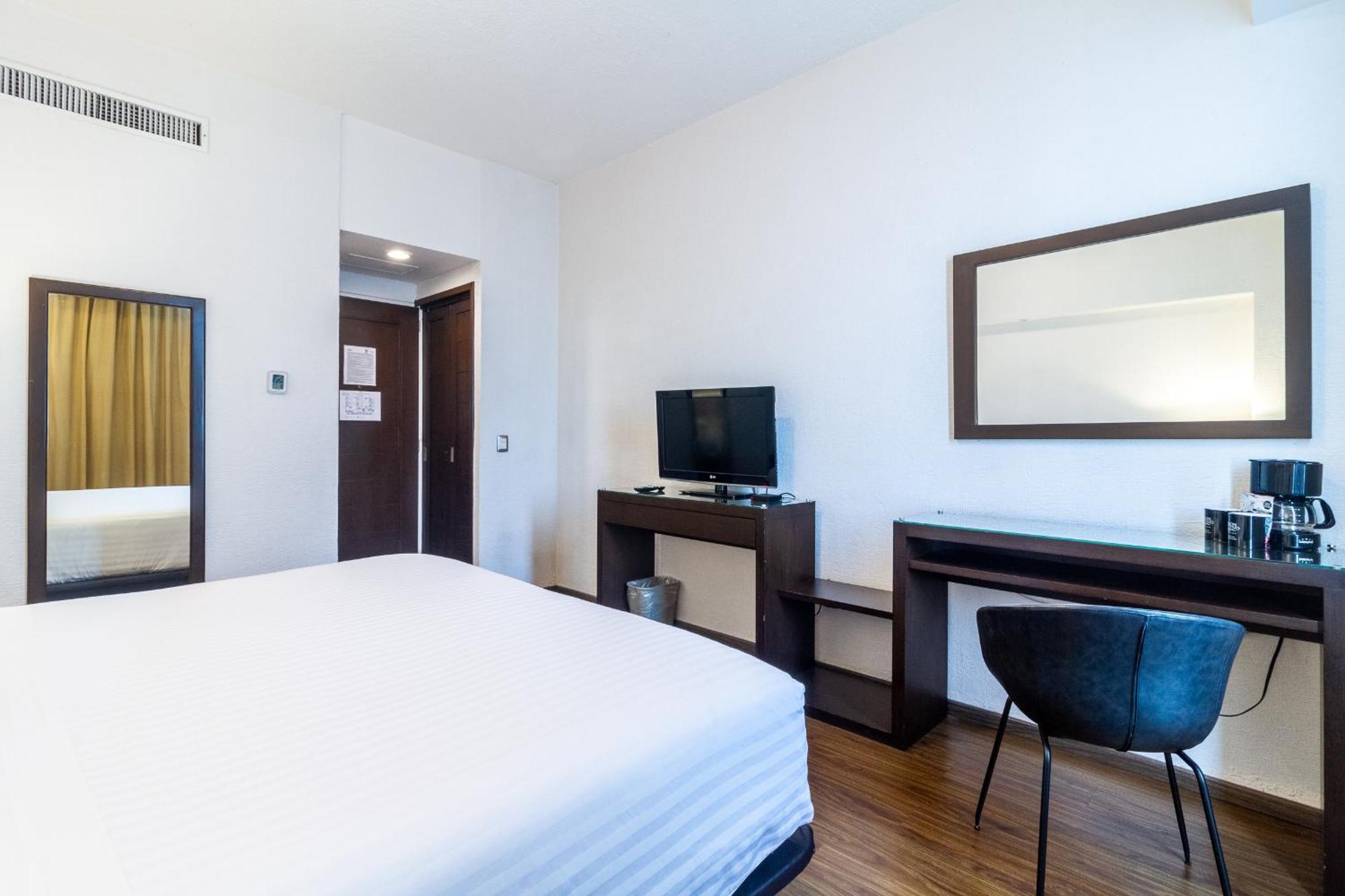 Hotel Meson Ejecutivo Guadalajara Minerva - Av Mexico Extérieur photo